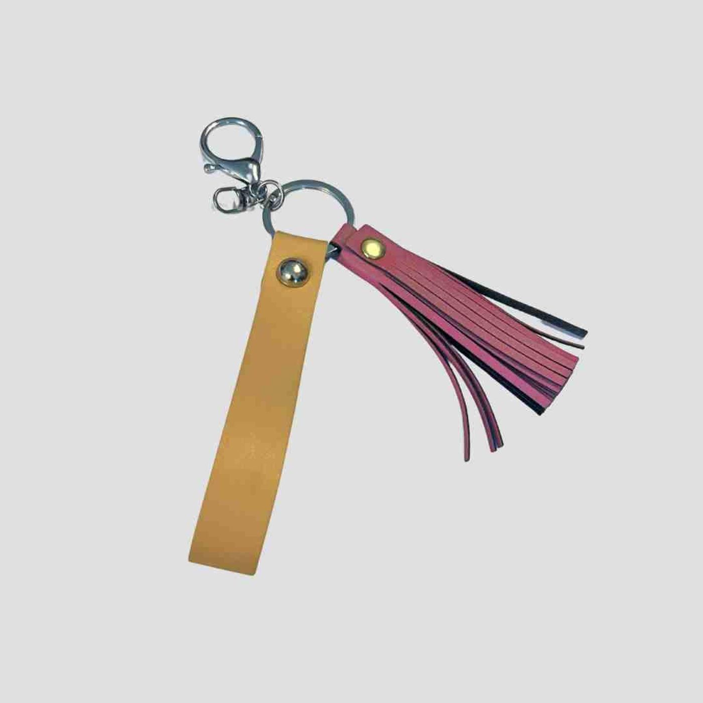 Morild Tassle med refleks, rosa/solgul