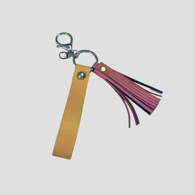 Hovedbilde Morild Tassle med refleks, rosa/solgul